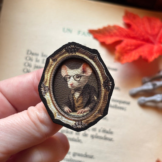 Broche. Le Notaire
